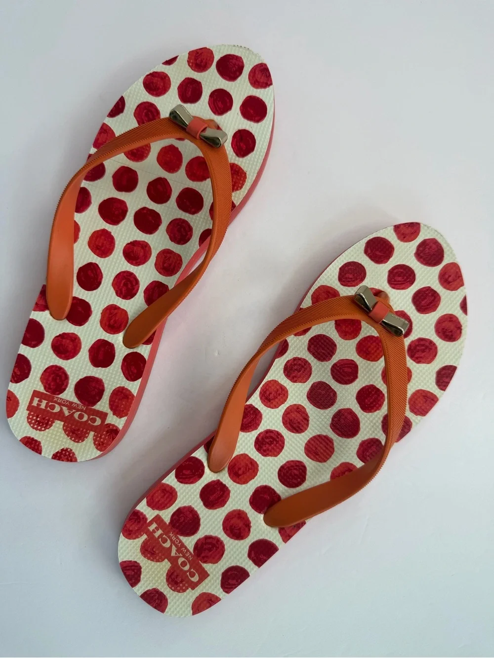 COACH Amel Coral Orange Polka Dot Flip Flops Sandals Gold Bow Women’s 7–8